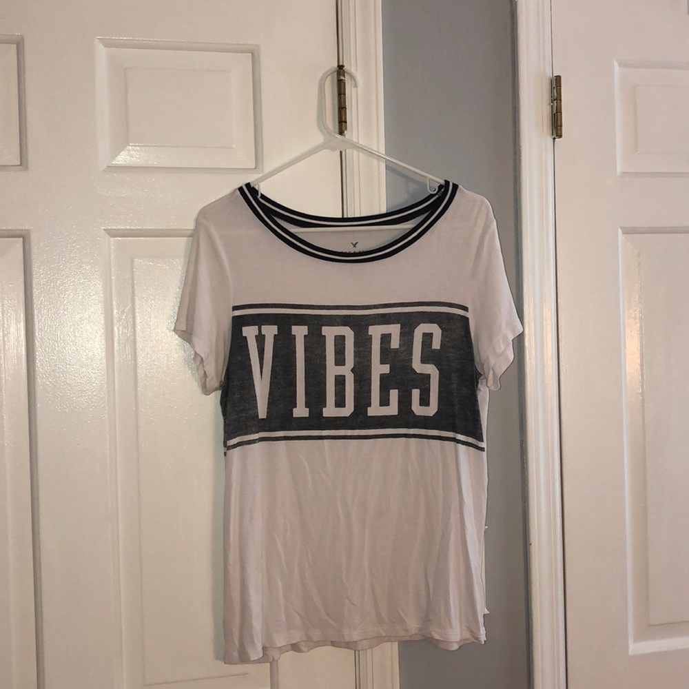 White and black T-shirt (“vibes”)